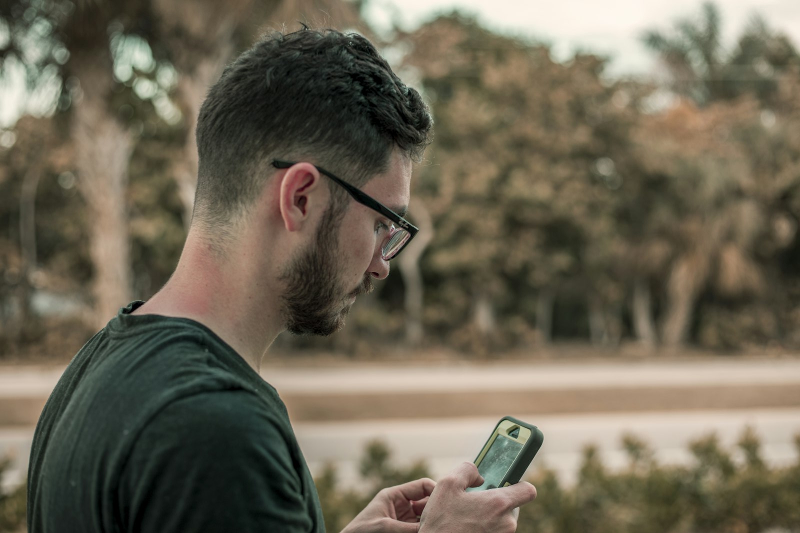 Person waiting impatiently for a slow website to load on a smartphone